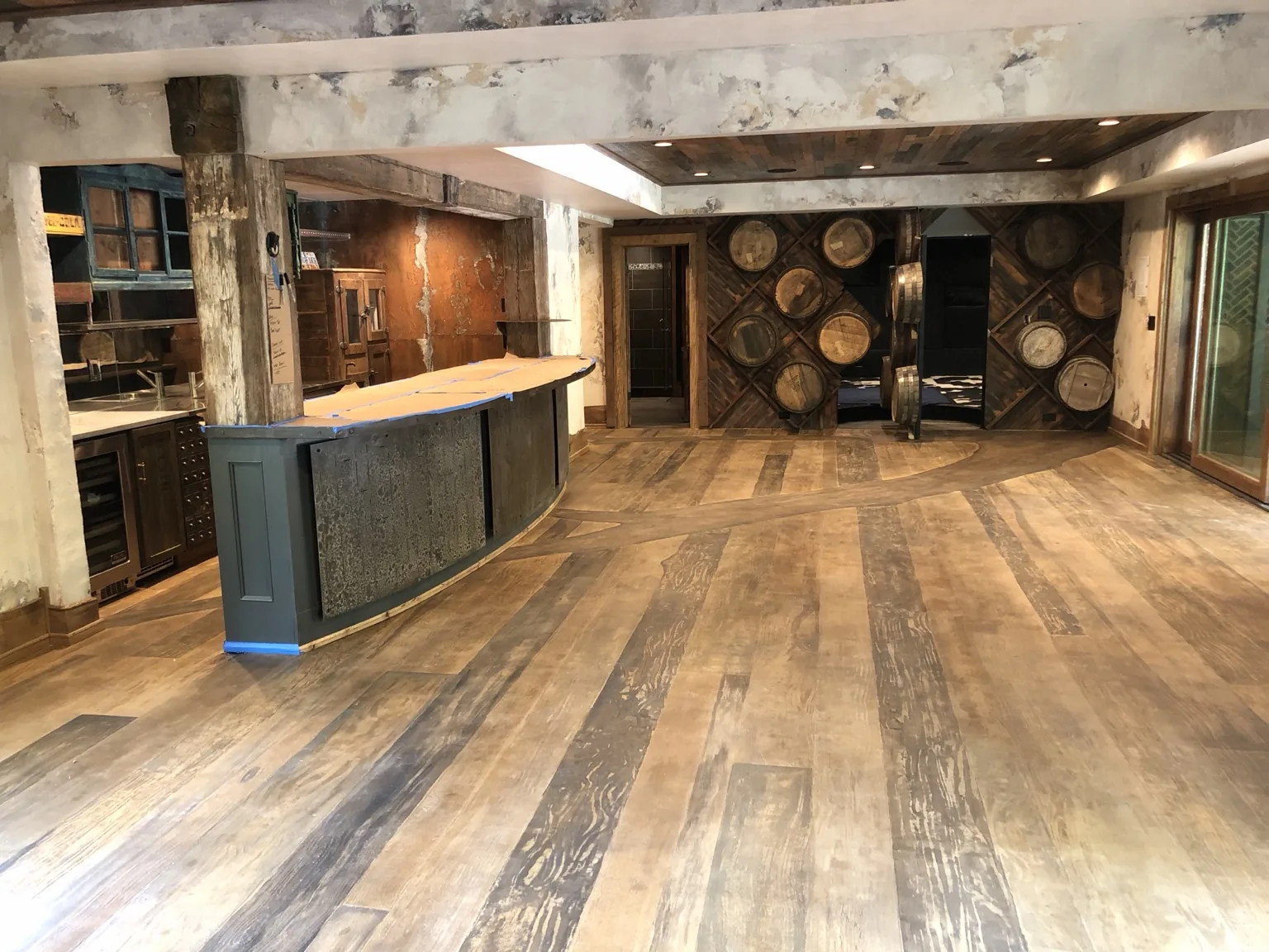 Large room with wood-look decorative floor
